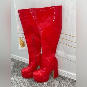 Red knee high boots